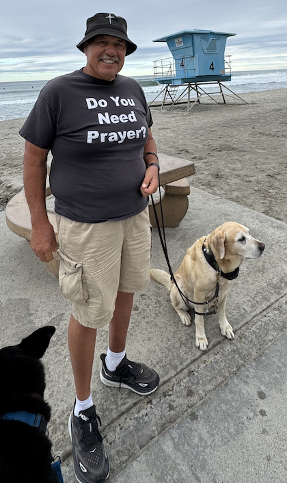 Brando the praying dog and Mark